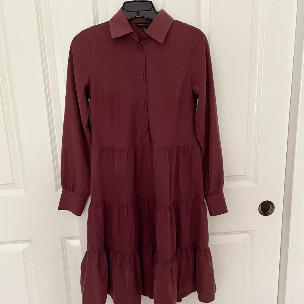 Downeast long sleeve dress in the color maroon and a size XS.